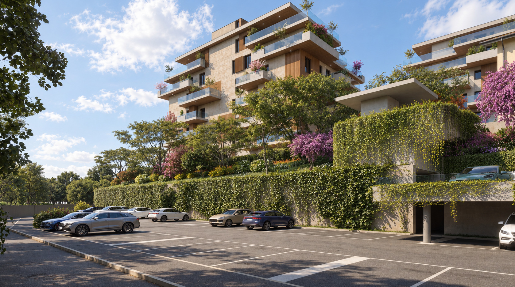 De Amicis Towers — Il fronte su strada e la vegetazione lungo il basamento