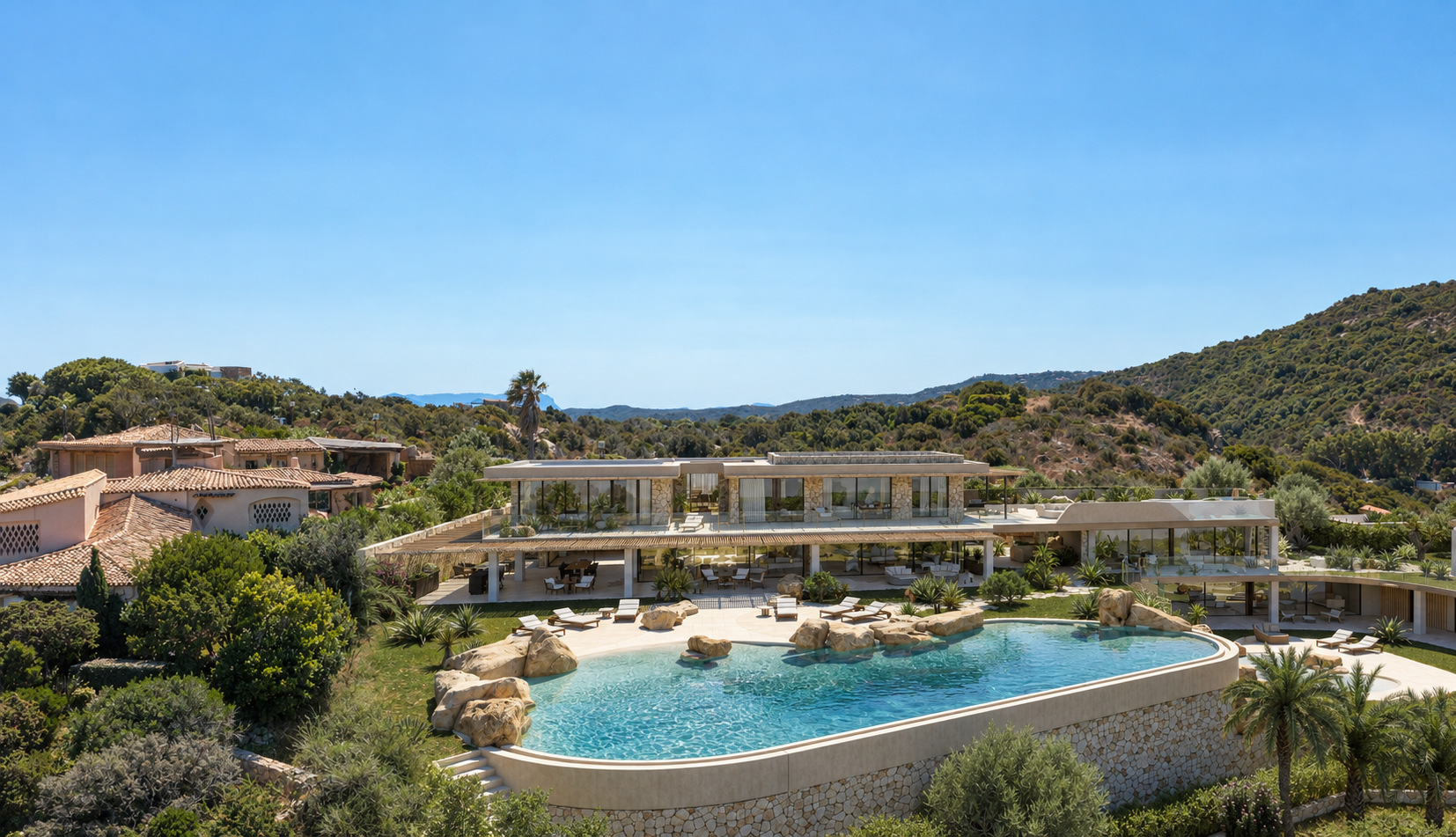 Villa Eden Rock — La villa e la piscina sinuosa inserite nel giardino